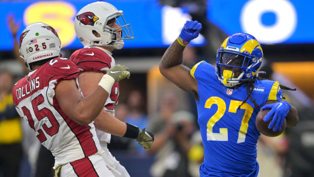 Nov 13, 2022; Inglewood, California, USA; Los Angeles Rams running back Darrell Henderson Jr. (27) beats Arizona Cardinals linebacker Zaven Collins (25) and linebacker Cameron Thomas (97) into the end zone for a touchdown in the second half at SoFi Stadium. Mandatory Credit: Jayne Kamin-Oncea-USA TODAY Sports